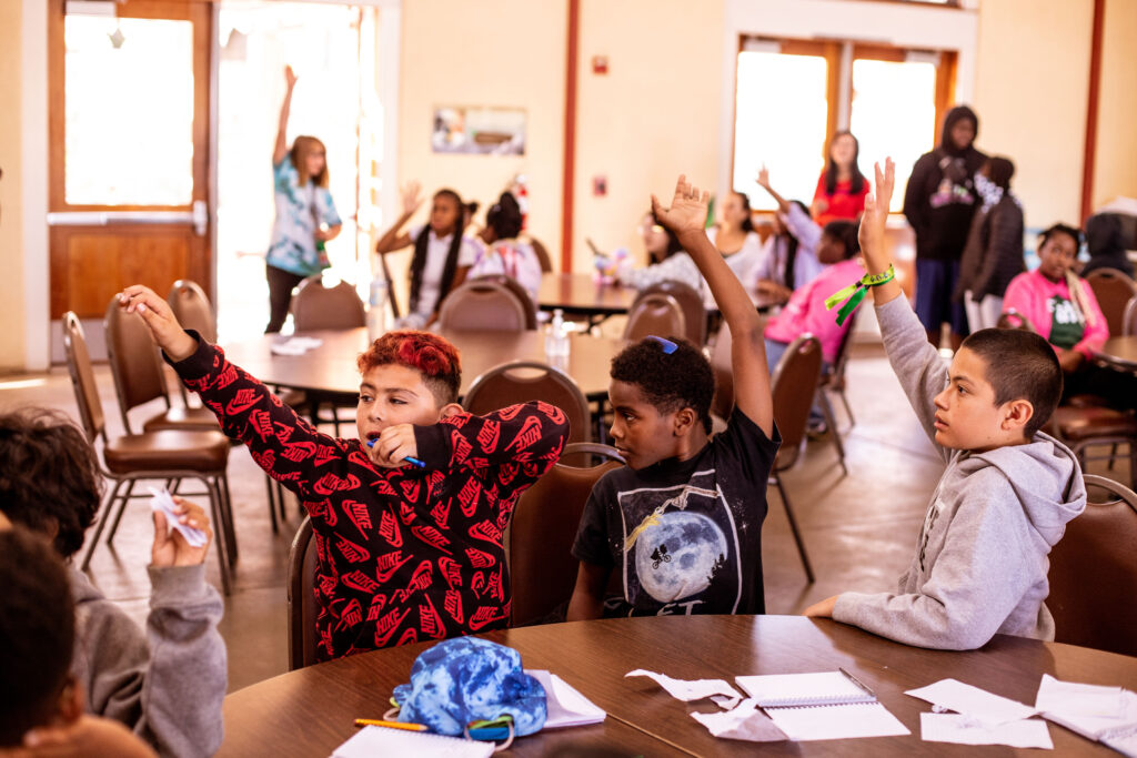 Kids at Camp Family Justice playing game.